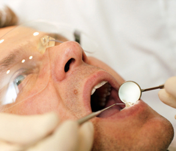 Dr. Amir Awadalla at Esquire Dental Center, Patient with dentist
